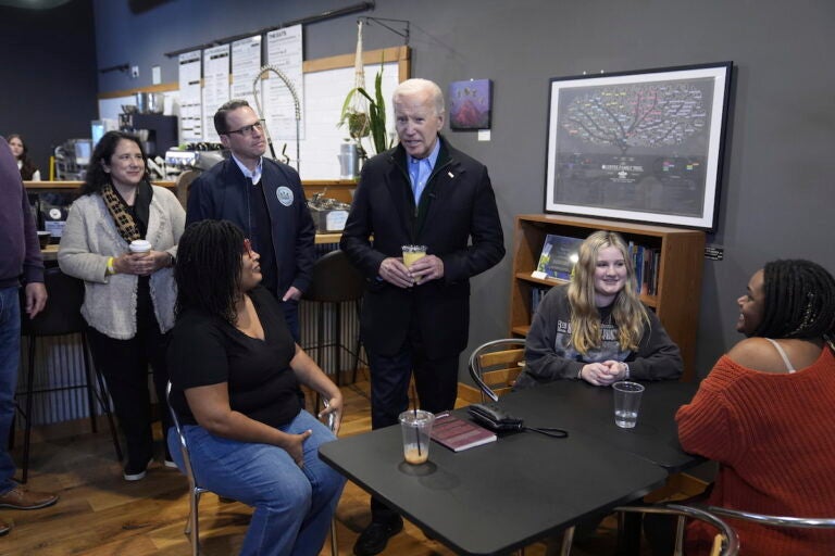 President Joe Biden talks to employees at the Nowhere Coffee shop, during a visit to discuss his economic agenda, Friday, Jan. 12, 2024, in Emmaus, Pa. (AP Photo/Evan Vucci)