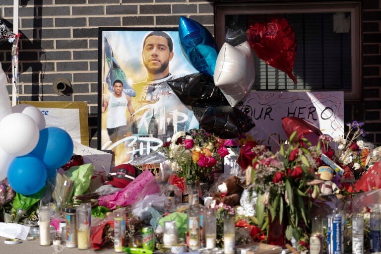 FIle photo: Items fill a makeshift memorial for Temple University Police Officer Christopher Fitzgerald, Feb. 23, 2023, in Philadelphia. On Tuesday, Jan. 23, 2024, Miles Pfeffer of suburban Philadelphia waived his right to a preliminary hearing and is headed to trial on charges including murder and murder of a law enforcement officer in the Feb. 19, 2023, slaying of 31-year-old Fitzgerald. (AP Photo/Matt Rourke, File)