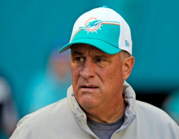 File photo: Miami Dolphins defensive coordinator Vic Fangio heads onto the field before the start of an NFL football game against the Carolina Panthers, Sunday, Oct. 15, 2023, in Miami Gardens, Fla.