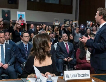 Meta CEO Mark Zuckerberg turns to address the audience during a Senate Judiciary Committee hearing on Capitol Hill in Washington, Wednesday, Jan. 31, 2024, to discuss child safety. X CEO Linda Yaccarino watches at left.