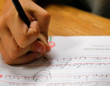 A student practices writing in cursive at St. Mark’s Lutheran School in Hacienda Heights, Calif., bucking a growing trend of eliminating cursive from elementary school curriculums or making it optional, California is among the states keeping longhand as a third-grade staple.