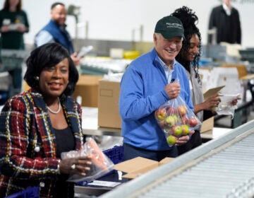 Joe Biden and Cherelle Parker working at the food bank together