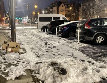 There's a bike lane under there somewhere. South 11th Street near Christian Street, Jan. 22, 2024. (Meir Rinde/Billy Penn)