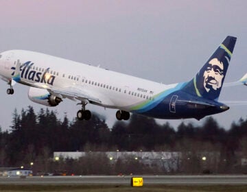 The first Alaska Airlines passenger flight on a Boeing 737-9 Max airplane takes off on a flight to San Diego from Seattle-Tacoma International Airport in Seattle on March 1, 2021. (Ted S. Warren/AP)