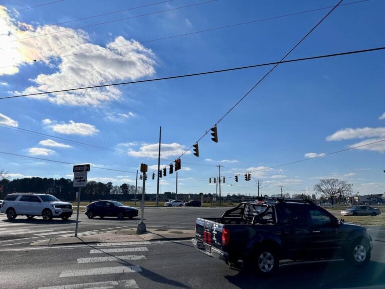 Cars at the intersection of Route 113 and Route 404