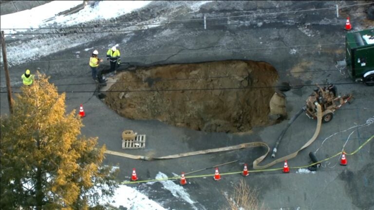 Overhead view of sinkhole in the street