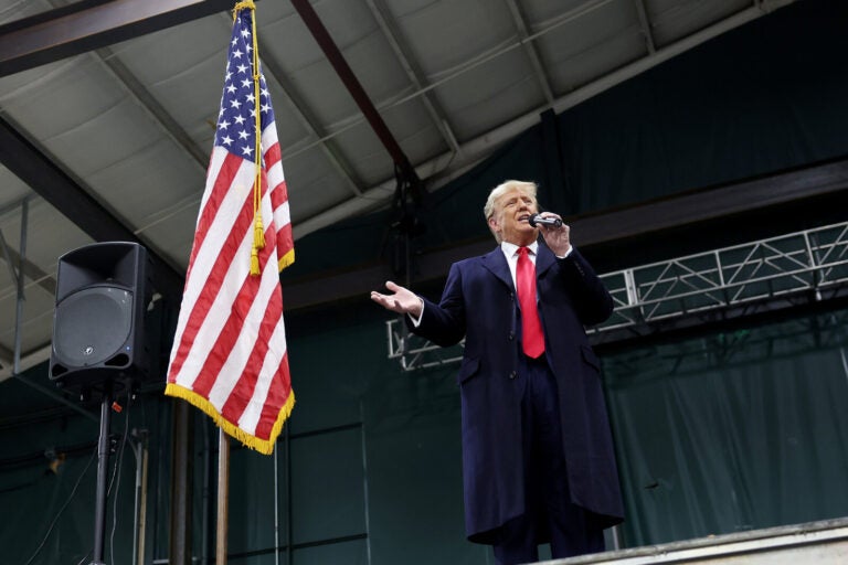DES MOINES, IOWA - JANUARY 15: Former president Donald Trump speaks to voters during a visit to a caucus site at the Horizon Event Center on January 15, 2024 in Clive, Iowa. Iowans vote today in the state’s caucuses for the first contest in the 2024 Republican presidential nominating process. (Photo by Kevin Dietsch/Getty Images)