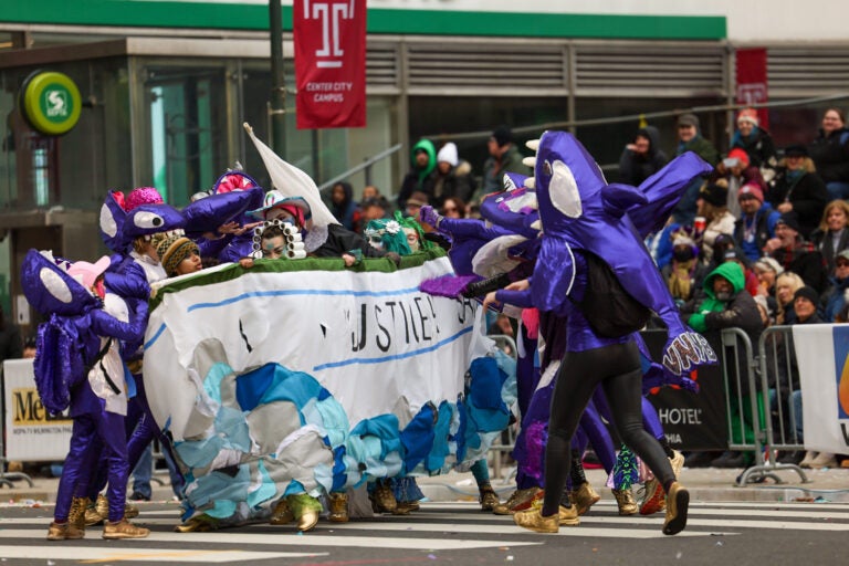 Mummers capsize the Supreme Court in a social justice-inspired skit at the annual Mummers Day Parade in Philadelphia