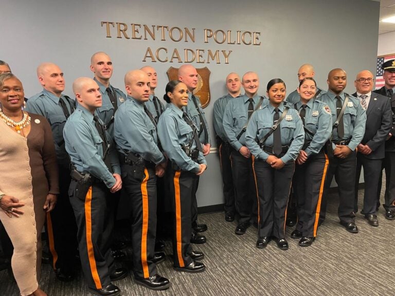 Fourteen new officers for the Trenton Police Department pose for a photo