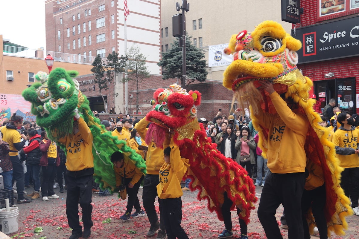 Lions danced throughout Chinatown on Sunday to celebrate the Lunar New Year. (Cory Sharber/WHYY)