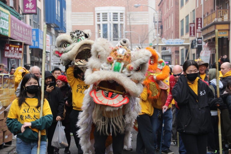 Lions danced throughout Chinatown on Sunday to celebrate the Lunar New Year. (Cory Sharber/WHYY)