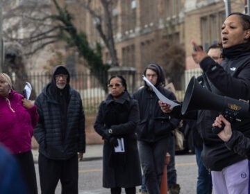 Juanita Clark speaks to a group of protesters