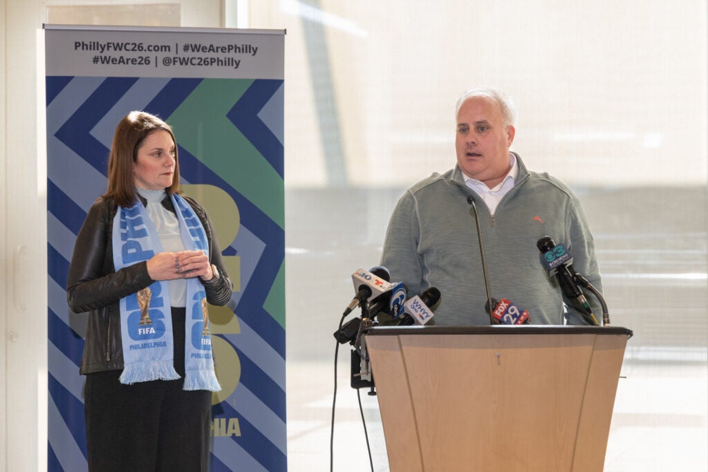 Frank Gumienny speaking at a podium