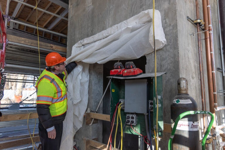 Construction workers working on a station