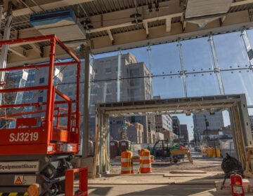 The inside of the ongoing construction of PATCO's Franklin Square station, made with bird-safe glass