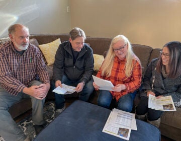 Carla Sessions (second from right) and her neighbors have been fighting against a proposal to develop athletic fields and buildings on Haycock Camping Ministries.