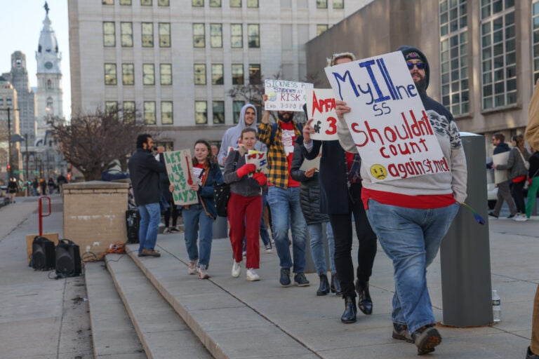 Protesters calling for a change to the school district's sick leave policy