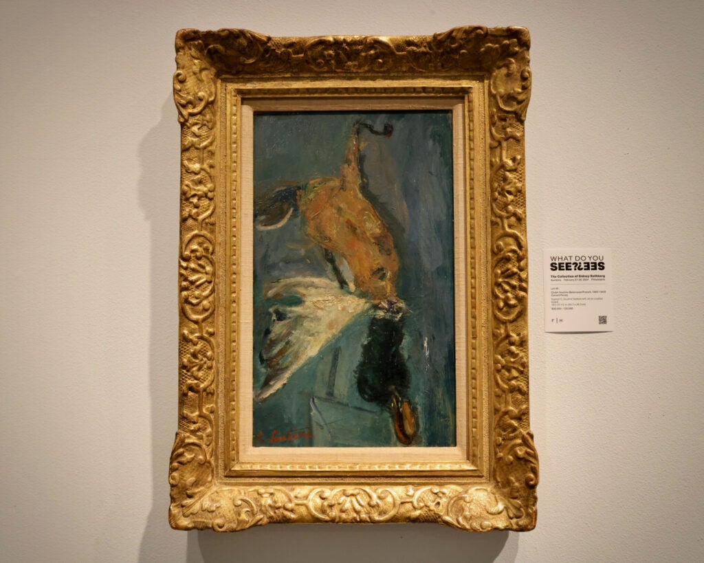 A painting hung on the wall in the exhibition