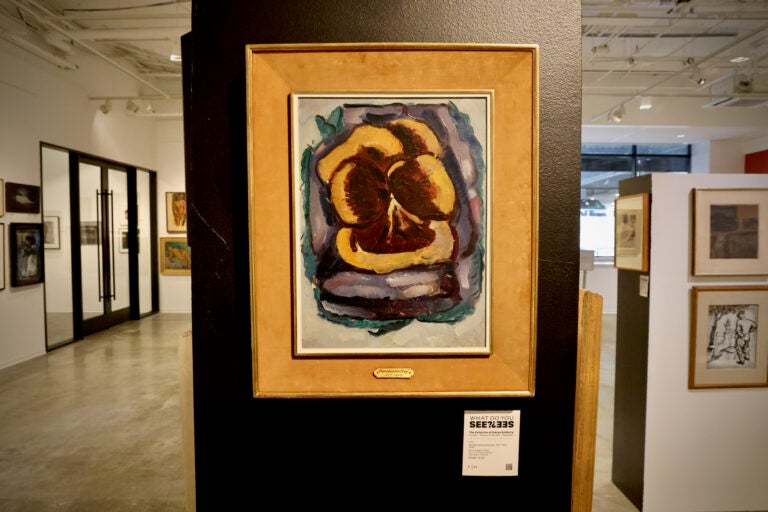 A painting hung on the wall in the exhibition