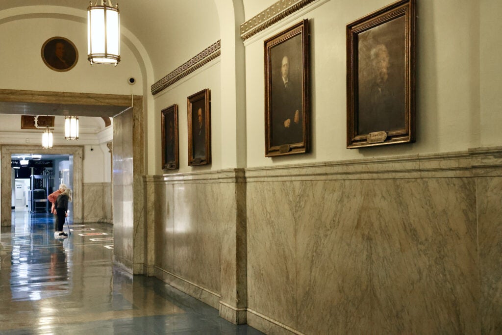 Portraits of mayors and council members that line the walls of City Hall's fourth floor are joined by portraits of Black Philadelphians tiling the floors,
