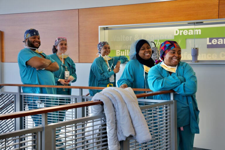 Shariah Harris's colleagues at Lankenau Medical Center look on as she is honored.