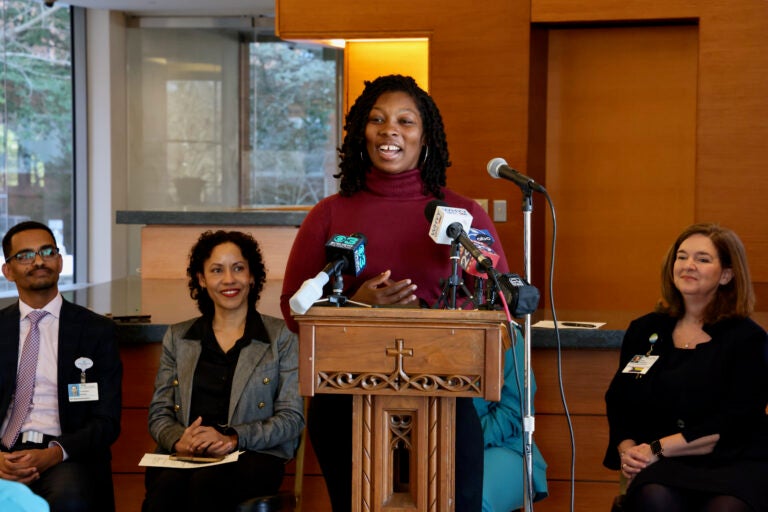 Shariah Harris speaks at a podium