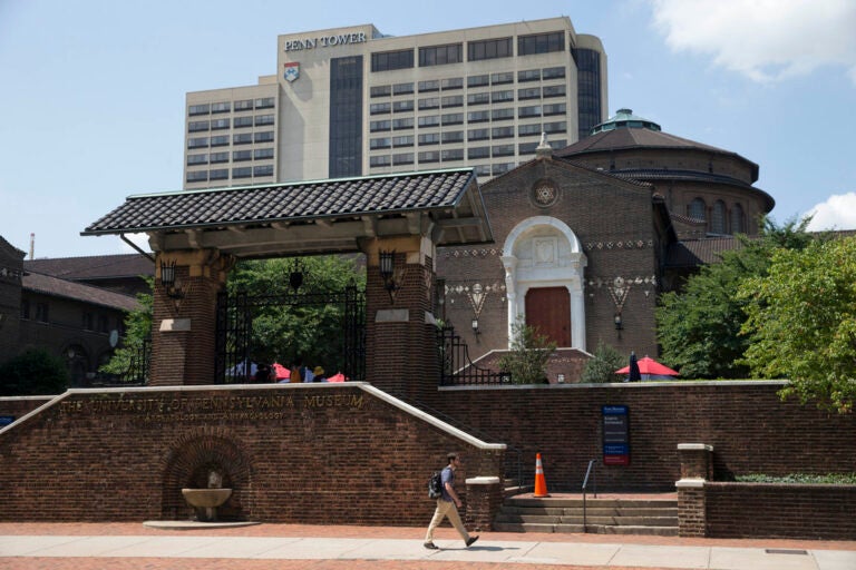 A man walks past the The Penn Museum, part of the University of Pennsylvania