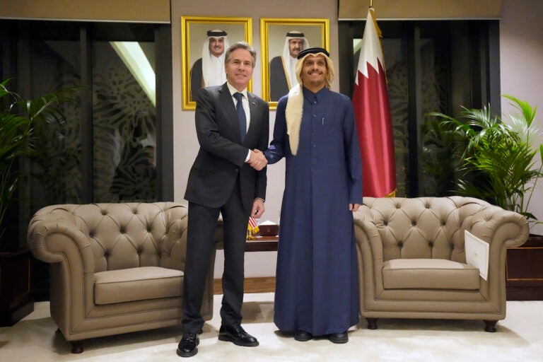 U.S. Secretary of State Antony Blinken (left) shakes hands with Qatar's Prime Minister and Foreign Affairs Minister Mohammed Bin Abdulrahman Al Thani, at Diwan Annex, in Doha, Qatar, Tuesday, Feb. 6, 2024.