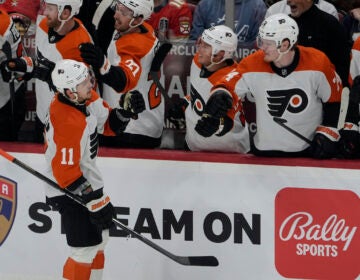 Philadelphia Flyers right wing Travis Konecny (11) celebrates his goal with his teammates during the second period of an NHL hockey game against the Florida Panthers, Tuesday, Feb. 6, 2024, in Sunrise, Fla.