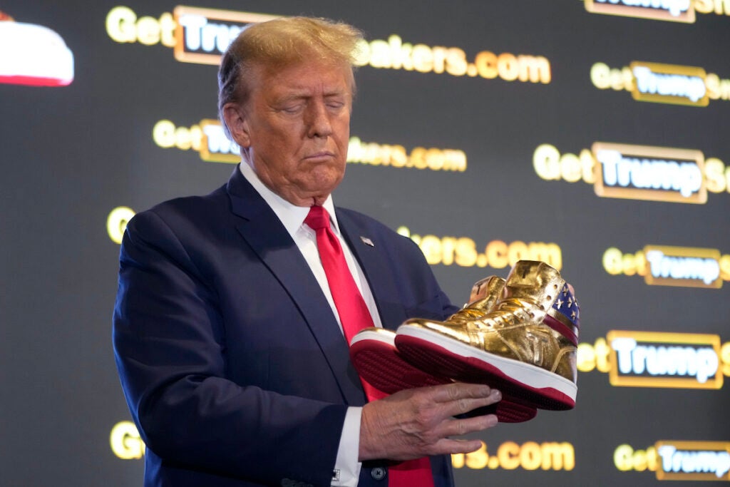 Donald Trump displays new shoes at Sneaker Con in Philadelphia