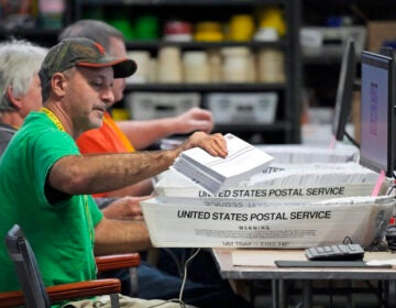 File photo: Allegheny County workers scan mail-in and absentee ballots at the Allegheny County Election Division Elections warehouse in Pittsburgh, Thursday, Nov. 3, 2022.