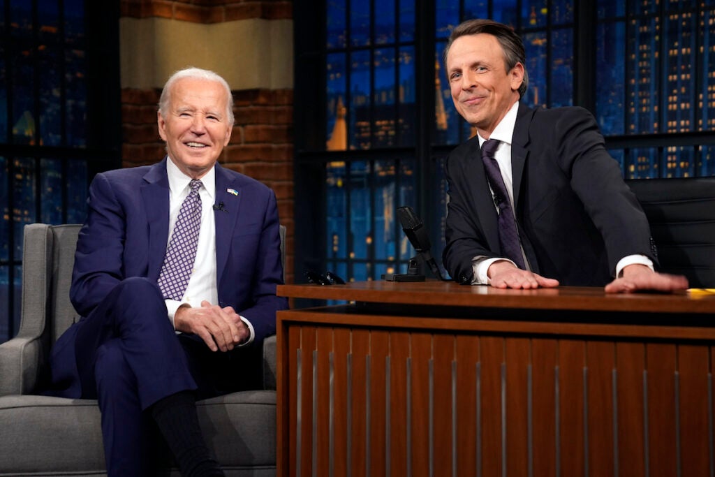 President Joe Biden talks with Seth Meyers during a taping of the ''Late Night with Seth Meyers'' Monday, Feb. 26, 2024, in New York.