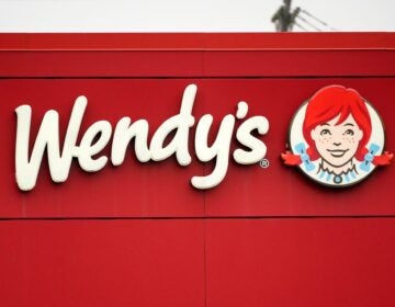 A sign advertising Wendy's