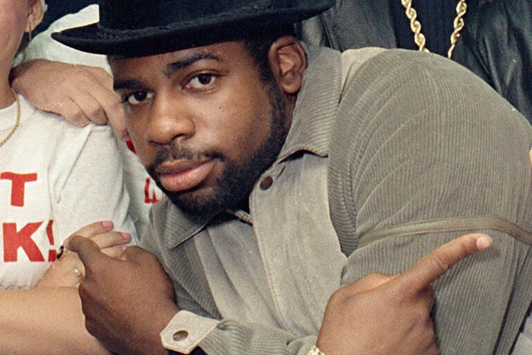 File photo: Run-D.M.C.'s Jason Mizell, Jam-Master Jay, poses with teenagers gathered at New York's Madison Square Garden, Oct. 7, 1986, in New York. Two men were convicted of murder Tuesday, Feb. 27, 2024 in the death of Run-DMC star Jam Master Jay, a brazen 2002 shooting in the rap legend's studio. An anonymous Brooklyn federal jury delivered the verdict in the trial of Karl Jordan Jr. and Ronald Washington.