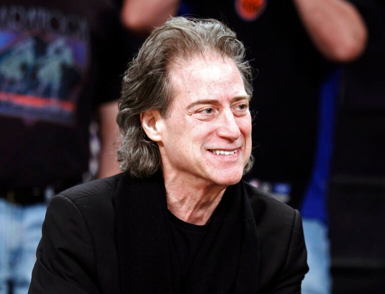 File photo: Comedian Richard Lewis attends an NBA basketball game in Los Angeles on Dec. 25, 2012. Lewis, an acclaimed comedian known for exploring his neuroses in frantic, stream-of-consciousness diatribes while dressed in all-black, leading to his nickname ''The Prince of Pain,'' has died. He was 76. He died at his home in Los Angeles on Tuesday night after suffering a heart attack, according to his publicist Jeff Abraham.