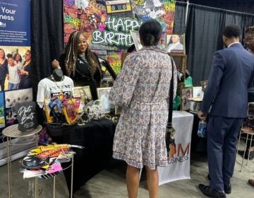Tanya Morris, CEO of Mom Your Business, speaks to attendees of the Black Business Expo in Philadelphia