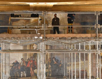 Workers repair damage in the Pa. Capitol