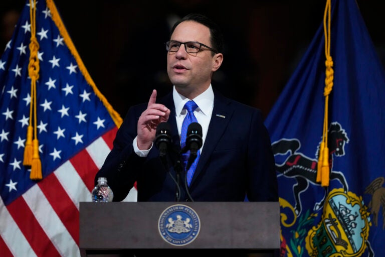 Governor Josh Shapiro speaks at a podium