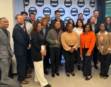 Students working with the global consulting business Aon through the Philadelphia Apprentice Network and Summer Search Philadelphia pose for a photo.