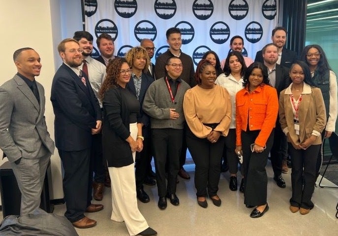 Students working with the global consulting business Aon through the Philadelphia Apprentice Network and Summer Search Philadelphia pose for a photo.