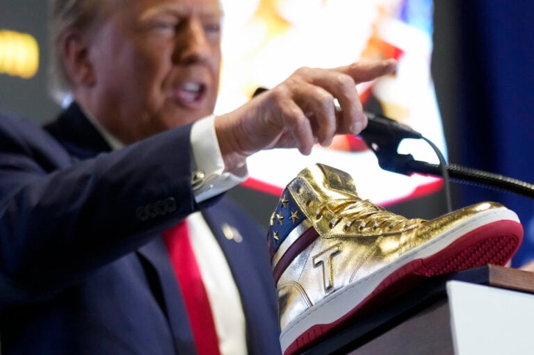 Republican presidential candidate Donald Trump unveiled his golden high-tops at Sneaker Con Philadelphia, an event popular among sneaker collectors, on Saturday.