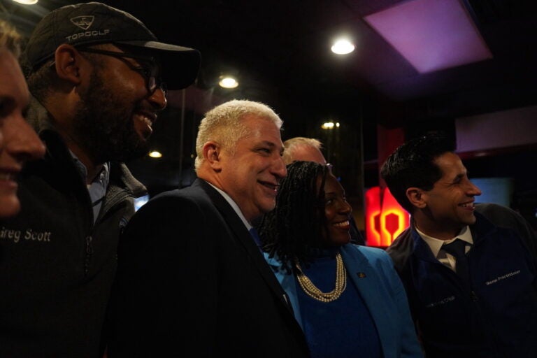 State Reps. Greg Scott, Jim Prokopiak Joanna McClinton, and Tarik Khan pose for a picture.