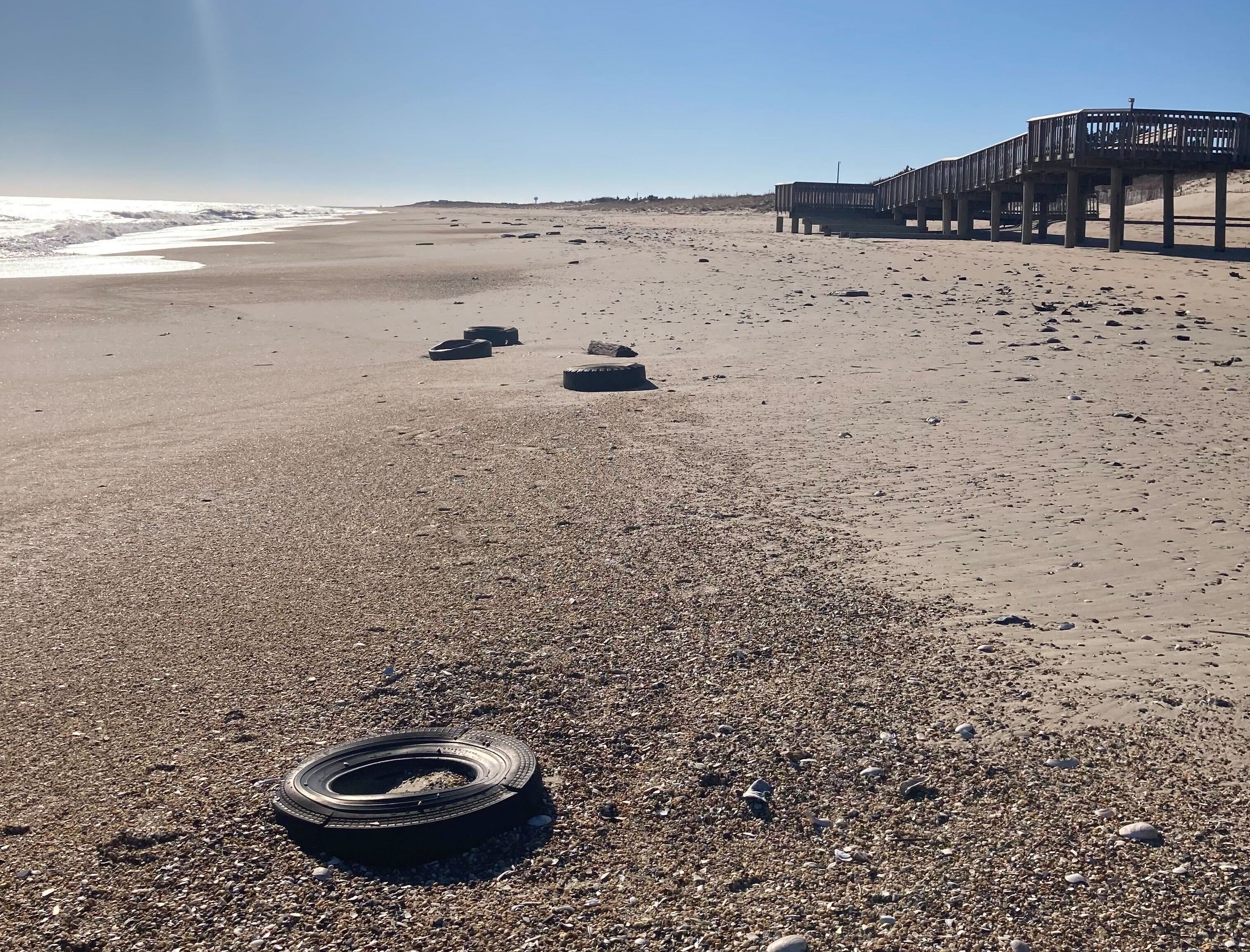 Delaware investigates where 100 tires washed ashore came from