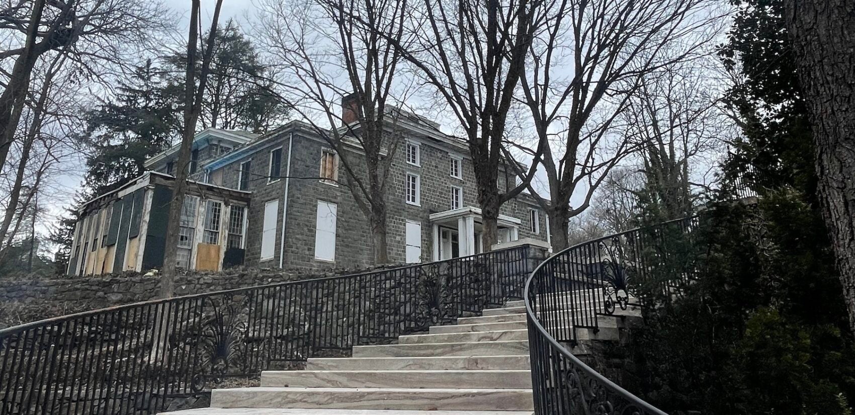 Long stairway leading up to the mansion