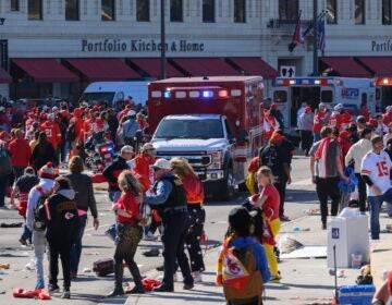 Police clear the area following a shooting at the Kansas City Chiefs NFL football Super Bowl celebration in Kansas City, Mo., Wednesday, Feb. 14, 2024.