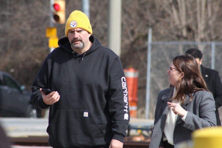 John Fetterman arriving to a press conference