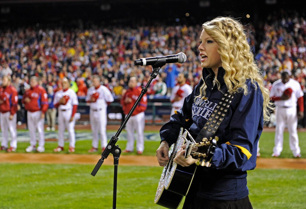 Singer Taylor Swift performs before Game 3 of the baseball World Series between the Tampa Bay Rays and Philadelphia Phillies Saturday, Oct. 25, 2008