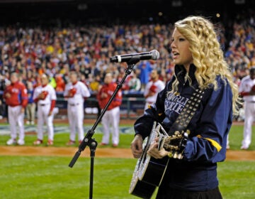 Singer Taylor Swift performs before Game 3 of the baseball World Series between the Tampa Bay Rays and Philadelphia Phillies Saturday, Oct. 25, 2008