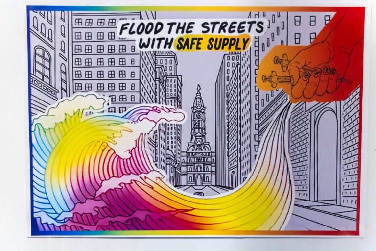 An image shows a wave in rainbow colors coming from a person's hand holding two syringes. In the background is Center City Philadelphia buildings. The text reads 