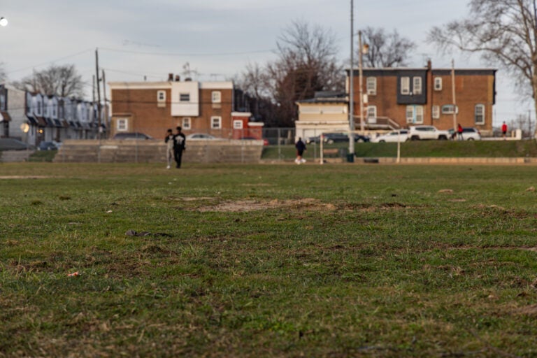 Up-close view of dirt patches and uneven ground on McCreesh Rec Center’s playing fields